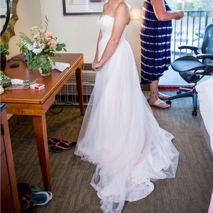 Wedding gown. Size 4. It’s a light pink in color